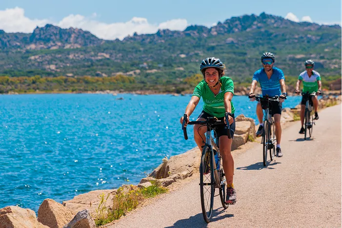 Bikers riding along the Mediterranean sea