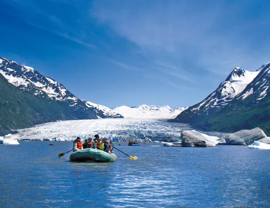 Rafting by a glacier in Alaska