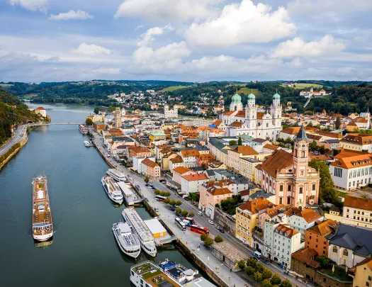 Aerial view of boats and cruise ships on the Danube River.