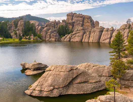 Rock formation and lagoon with trees