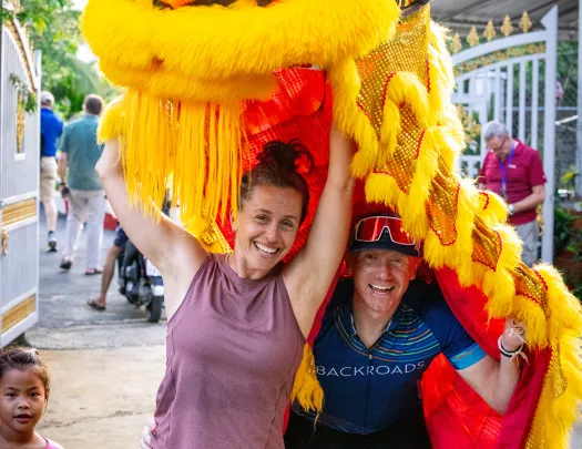 backroads guests with a dragon headress