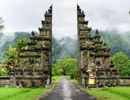 Shot of shrine/gateway in Bali, forest behind.