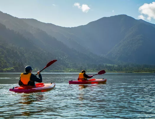 Asia & Pacific Kayaking on River with Mountain View