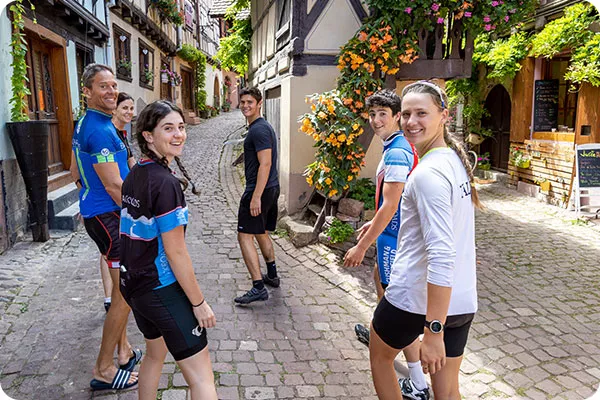 Family walking down the streets of Alsace