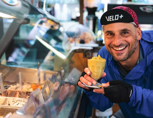 Biker posing with gelato.