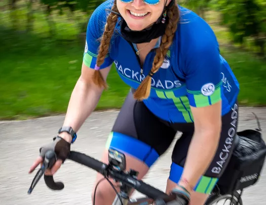 Action shot of leader on bike.