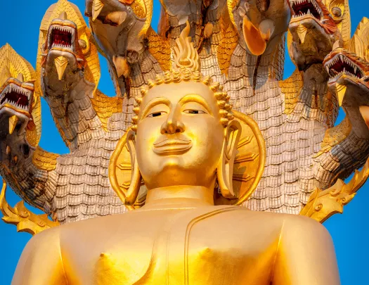 Golden shrine statue with a snake with 7 heads