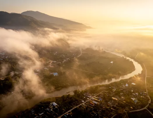 Fog rising over a city