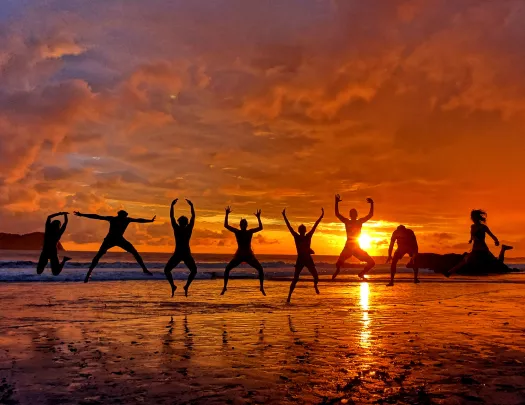Jumping into the Sunset Beach Costa Rica