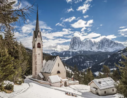 Snow covers a church