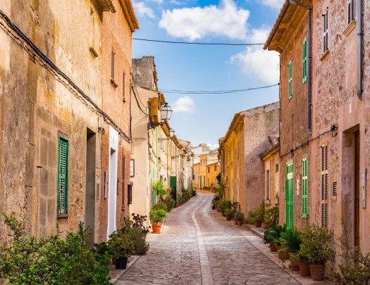 Stone alleyway with stone buildings on either side