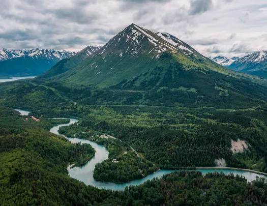 Wide shot of the Kenai River and it's surrounding mountain landscape.
