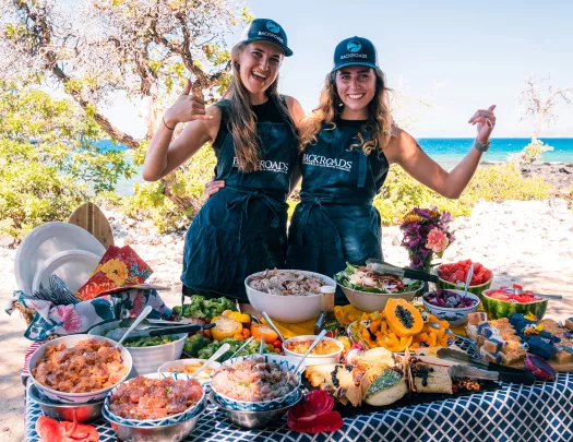 Two Backroads leaders with a picnic at the beach in Hawaii