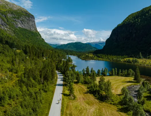 Bird's eye view of a rode winding through a river valley