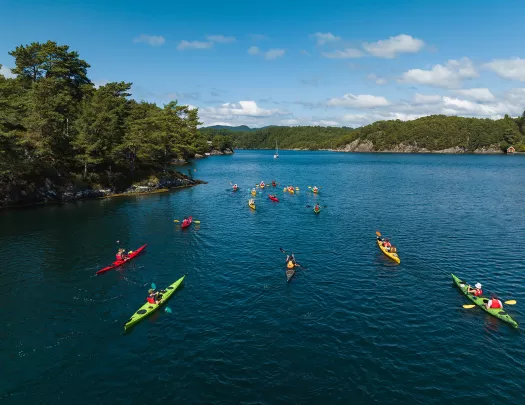 kayaks on a blue river