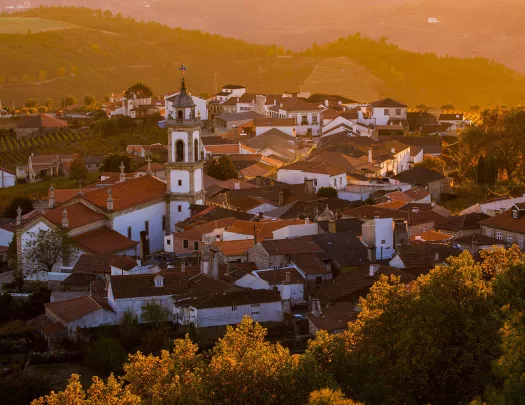 Sky view of a town with white and red buildings