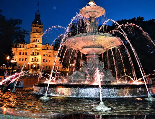 Large fountain instillation at night.