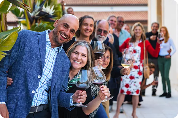 Group of travelers toasting with wine