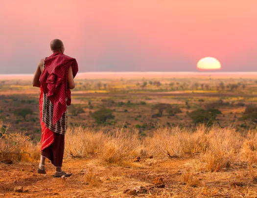 Masai looking at the sunset in Tanzania