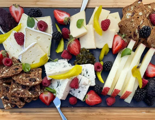 Charcuterie spread, cheese, fruits, crackers, etc.