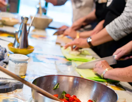 Close-up of guests at cooking class.