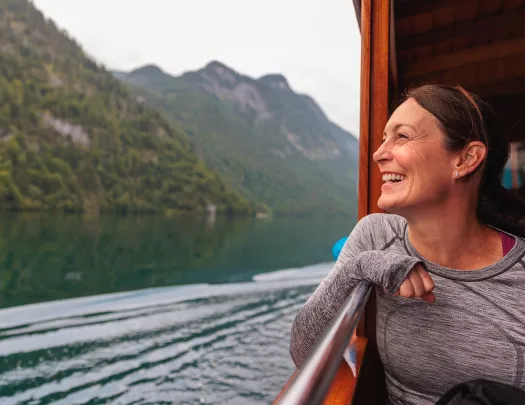 a person looking out onto the water from a boat