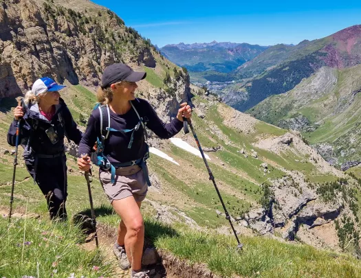 Backroads guests hiking with hiking poles