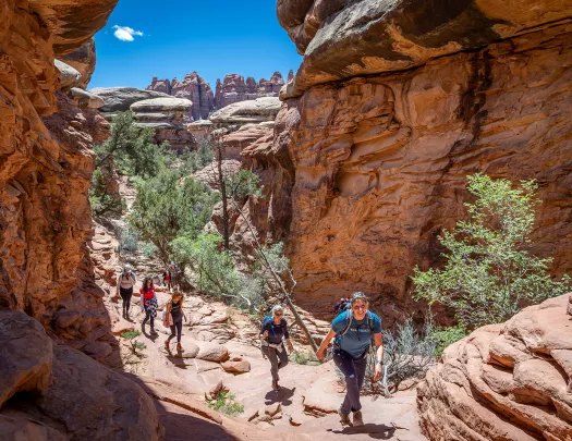 Backroads guests hiking canyons on a sunny day