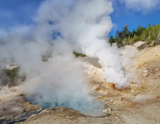 Active geyser with steam coming from the ground