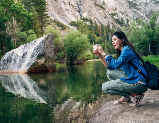 A hiker stops to take a photo