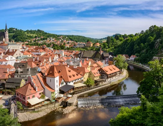 Aerial view of a city in Austria with red roofs.